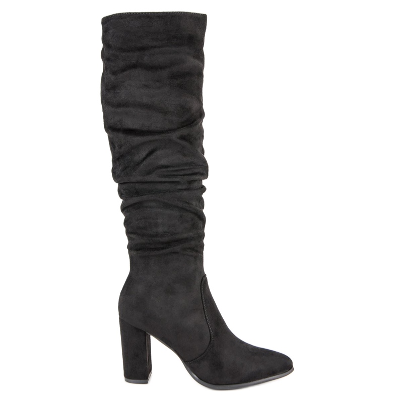 Super Mode Bottes noires sur le poteau le noir