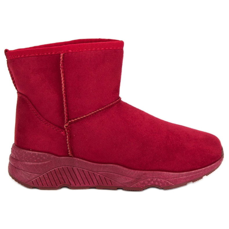 Bottes de neige sur la plate-forme rouge