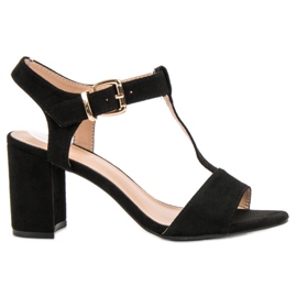 Anesia Paris Sandales noires sur un bar
