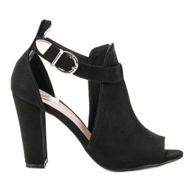 Queen Vivi Chaussures en daim sur un bar le noir