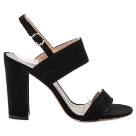 SHELOVET Sandales noires sur un bar