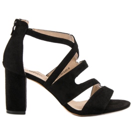 Evento Sandales en daim sur un bar noir