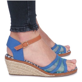 Sandales bleues sur le talon bas compensé Monro
