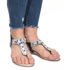 Sandales plates noires avec losanges Larissa