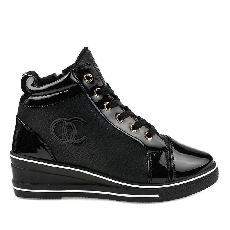 Baskets élégantes noires sur le talon compensé R15-2 le noir