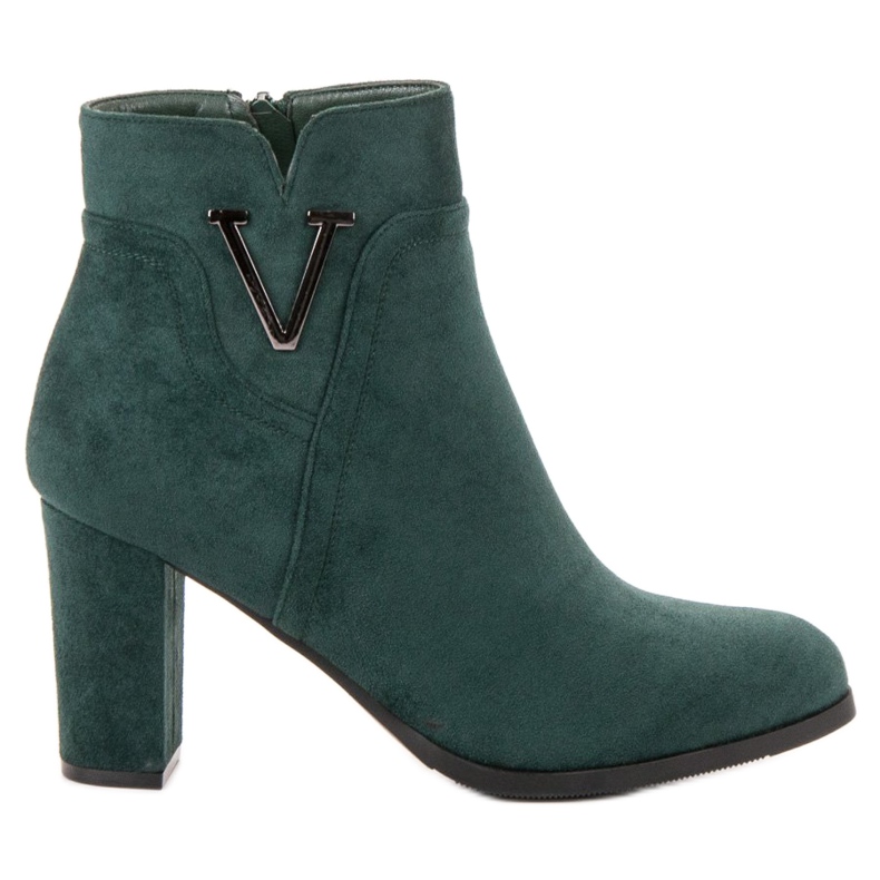 Vinceza Bottines en daim sur un bar vert