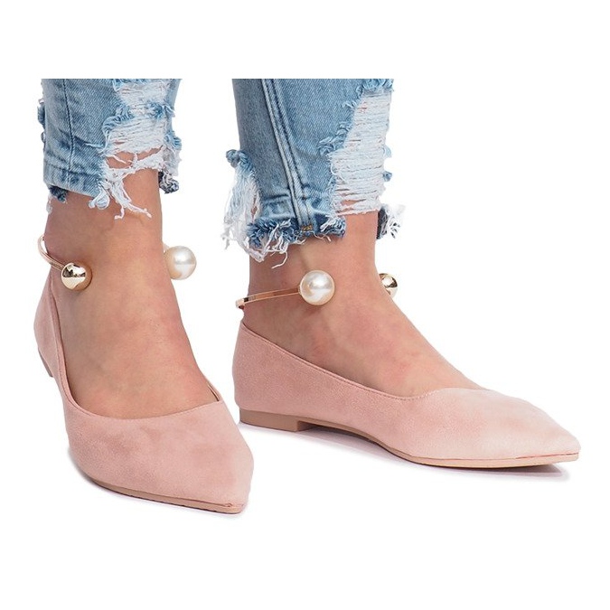 Ballerines en fourrure rose avec perles
