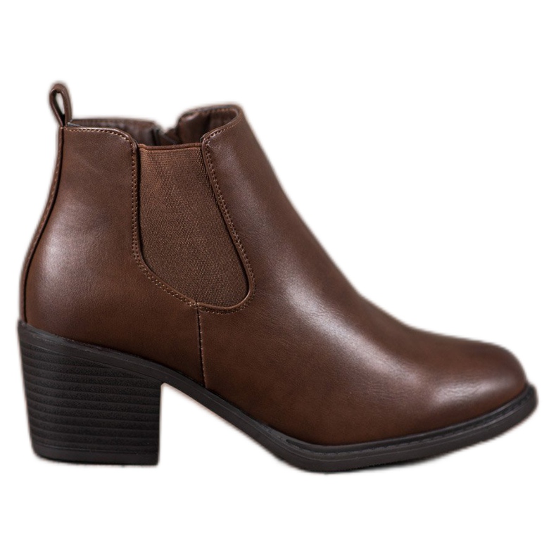 Anesia Paris Bottines brunes sur un poteau Anesia Paris Bottines brunes sur un poteau