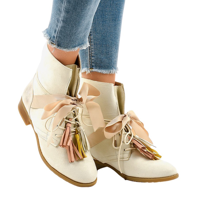 Bottines plates beiges nouées à franges A-226