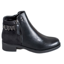 Ideal Shoes Bottes noires sur un talon plat le noir