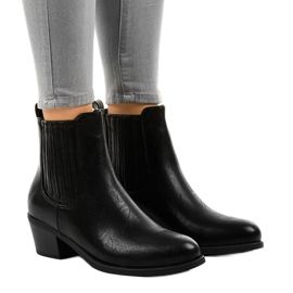 Bottines noires sur le poteau TX-3200 le noir