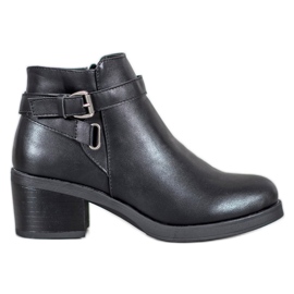 Anesia Paris Bottes sur un poteau noir