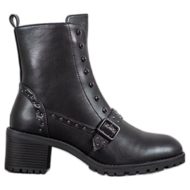 SHELOVET Bottines noires sur un poteau