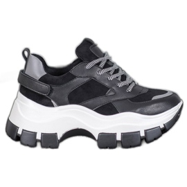 Weide Baskets noires sur la plateforme le noir