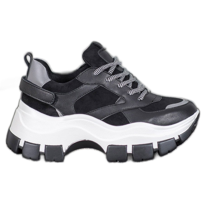 Weide Baskets noires sur la plateforme le noir