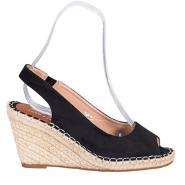 Small Swan Sandales noires sur un haut compensé