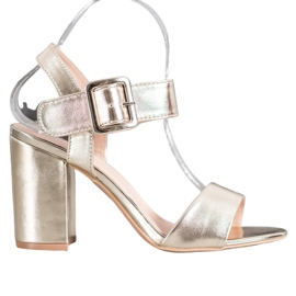 Small Swan Sandales sur une barre avec cuir écologique doré