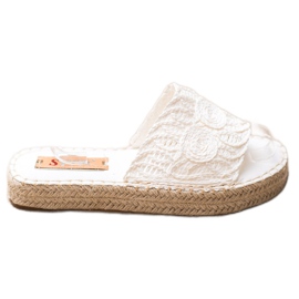 Seastar Pantoufles Sur Une Plate-Forme De Paille blanc