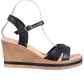 Sea Elves Sandales avec cuir écologique sur un coin noir