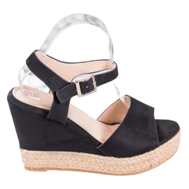 Clowse Sandales noires sur un haut compensé