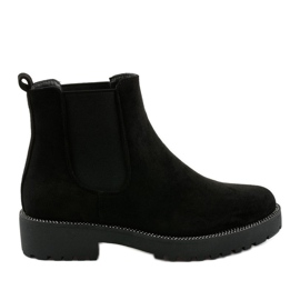 Bottines plates en daim noir par Nahneva le noir