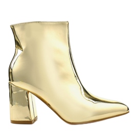 Bottines dorées sur le poteau, la fermeture éclair SY50P Gold