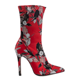 Bottines rouges avec une chaussette Santana