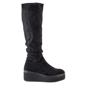 Bottes sur la plate-forme de Sergio Leone noir