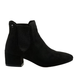 Bottines Chelsea noires sur le post Naurea
