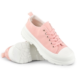 Baskets roses sur une plate-forme basse 1 Baskets roses sur une plate-forme basse 1