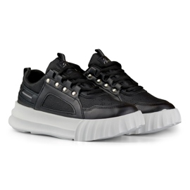 Chaussures de sport pour femme noires à semelle blanche 2