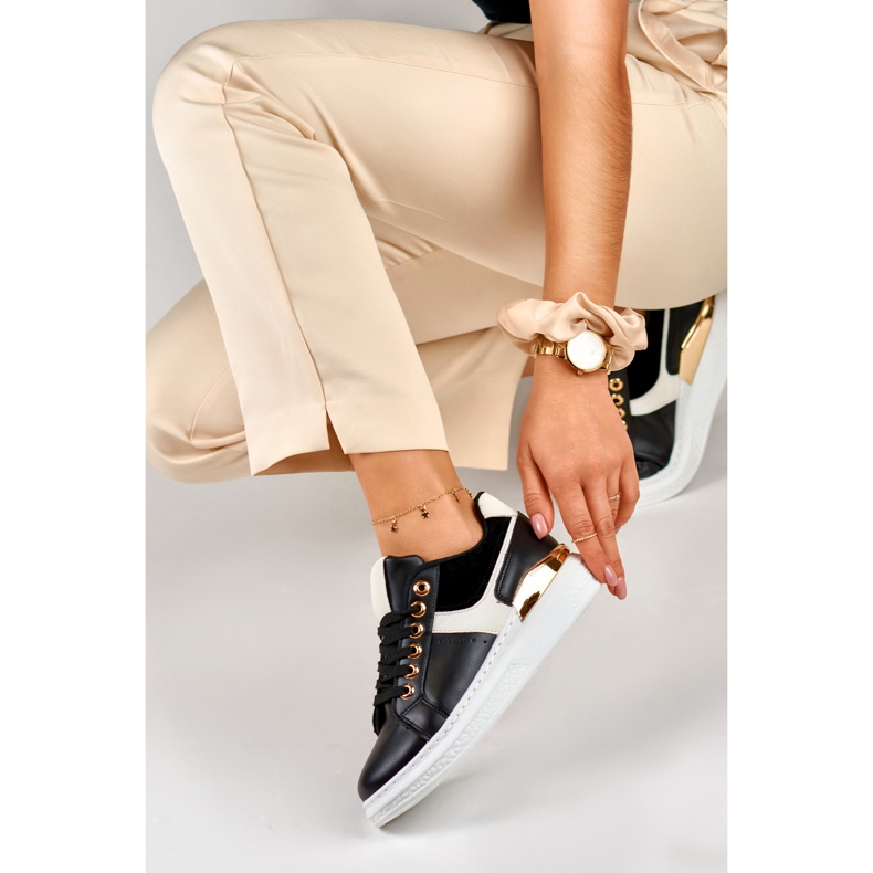 Baskets noires et blanches pour femmes sur la plateforme Eliza 1