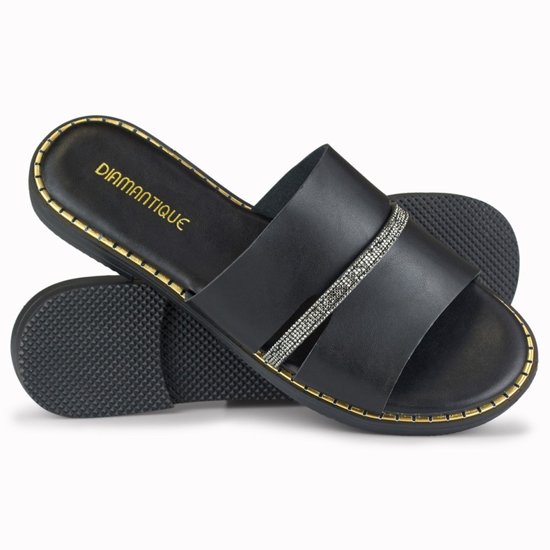 Élégantes pantoufles noires pour femmes avec une décoration 1