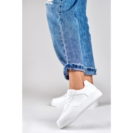 Baskets de sport blanches classiques avec une semelle blanche 5