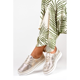 Chaussures de sport dorées pour femmes en cuir véritable 1