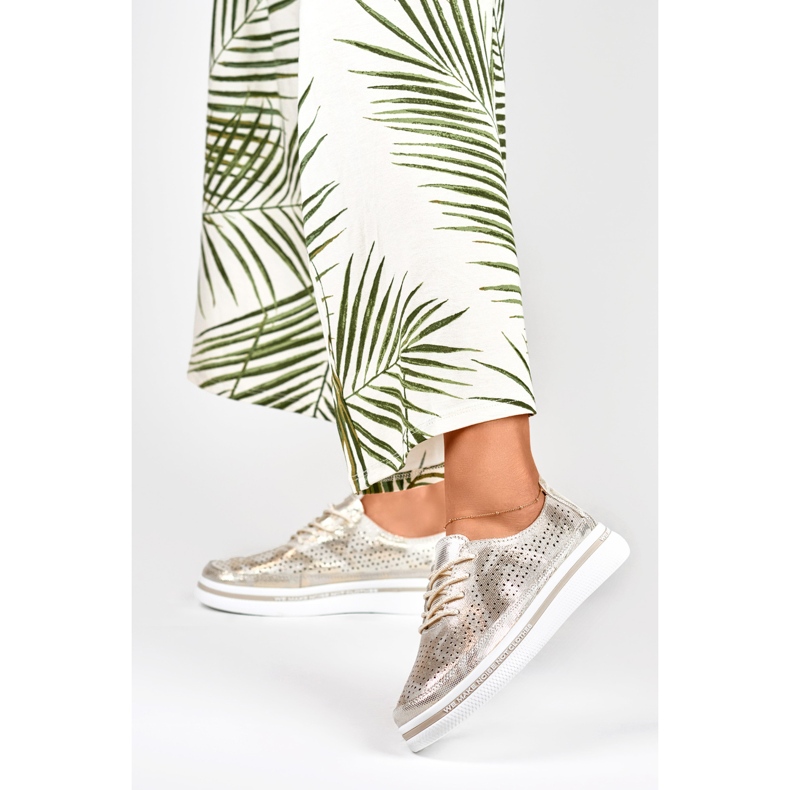 Chaussures de sport dorées pour femmes en cuir véritable d'or 2 Chaussures de sport dorées pour femmes en cuir véritable d'or 2