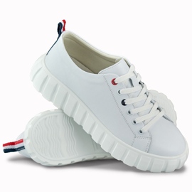 Chaussures de sport blanches en cuir pour femme 1