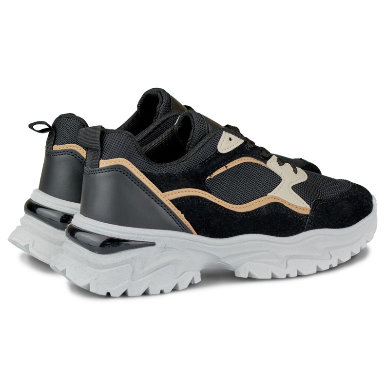 Baskets noires pour femmes sur semelle blanche 1