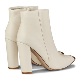 Bottes beiges pour dames avec une pointe décorative 3