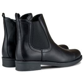 Bottines Chelsea noires classiques pour femmes en cuir écologique 1