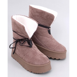 Boots de neige kaki en peau de mouton beige 1