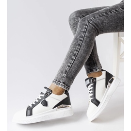 Baskets blanches et noires avec un accent argenté de Via 2
