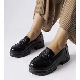 Mocassins Fuori noirs avec bande de roulement apparente 1