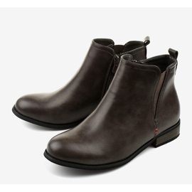 Bottes isolées grises avec une fermeture éclair Simplegleam 1