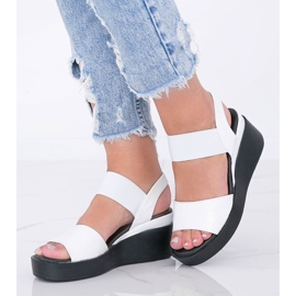 Sandales compensées blanches de Wins 1