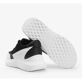 Sneakers noires avec détails blancs sur une semelle haute Barteks blanche le noir 1