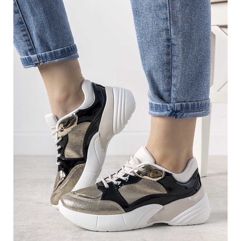 Baskets dorées à semelle haute Rude noir 1