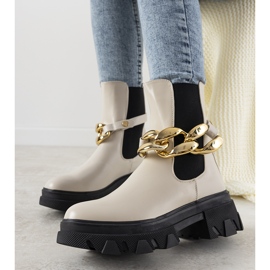 Bottes beiges avec chaîne Attention 2