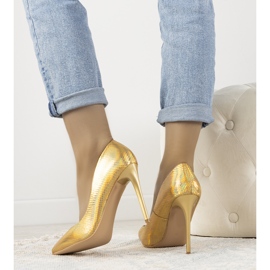 Les talons dorés irisés d'Audrey 1