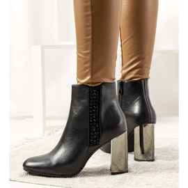 Bottes noires sur un talon argenté de Demott le noir 2
